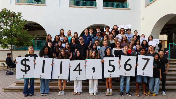 SDSU students reveal the record-breaking donation total for Aztecs Rock Hunger 2025. Photo Credit: Ruby Parrott
