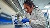 Charisma Tanaka-Herrera, an environmental engineering undergraduate sets up equipment for a pollution tracing experiment.