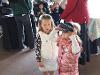 Young festival goers try on a VR headset from SDSU’s Virtual Immersive Teaching and Learning Research Center (VITaL), gaining an immersive STEM experience.  (Bryana Quintana/SDSU)