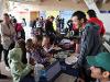 Members of SDSU’s Society of Hispanic Professional Engineers (SHPE) work with students to construct designs out of marshmallows and pasta. (Bryana Quintana/SDSU)