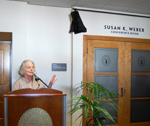 Susan K. Weber speaks alongside her namesake room.