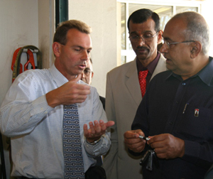 Engineering professor Rob Dowell speaks with representatives from PSG Institutions.