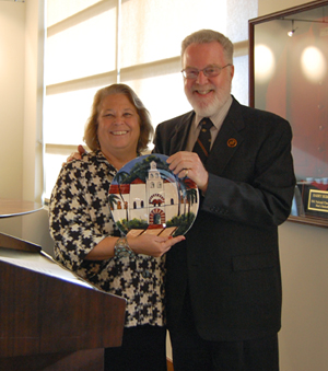 President Stephen L. Weber (right) presents Denise Ducheny with the Public Service Award.