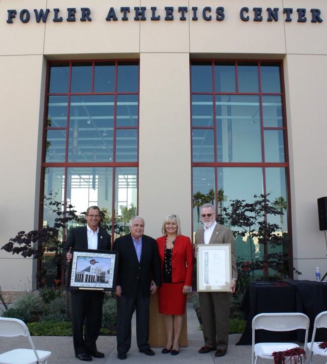 Jim Sterk, Ron and Alexis Fowler and President Weber celebrate the unveiling of the Fowler Athletics Center at SDSU