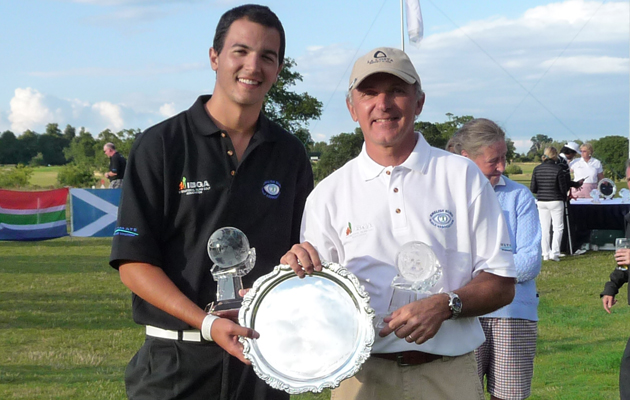 Poincenot and his father and golf course guide, Lionel, accept the first-place plaque at the 2010 International Blind Golf Associations World Championships.