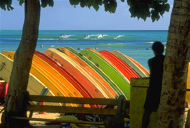 Waikiki Beach in Hawaii is a popular surfing destination.