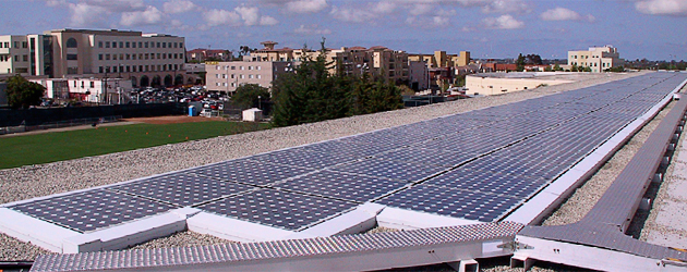 Solar panels sit atop many campus buildings, including the Music building.