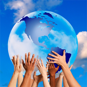 Diverse hands holding up a globe