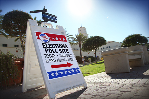 A sign directs people to a polling station at SDSU's Parma, Payne Goodall Alumni Center.