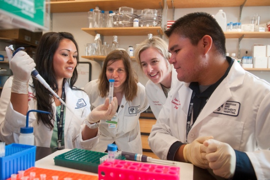 Kristen Regini (left) at Harvard Medical School.