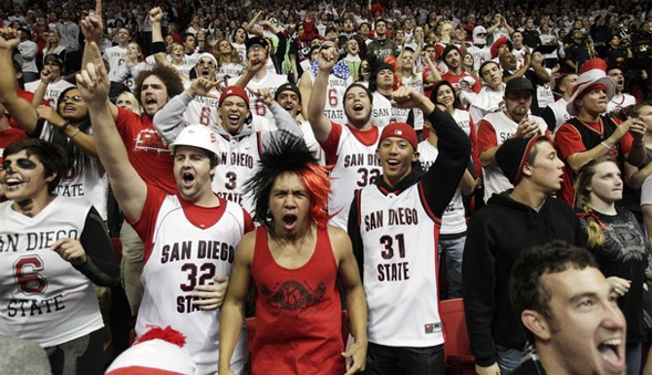 Members of The Show, SDSU's student section, cheer during a men's basketball game.