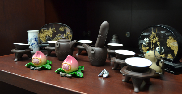The Confucius Institute library displays these decorative articles for a Chinese tea ceremony. Photo: Crystal Qian