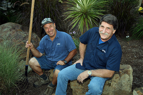 Robert Humphus, left, and Charles Barranco are among the staff who maintain the SDSU campus.