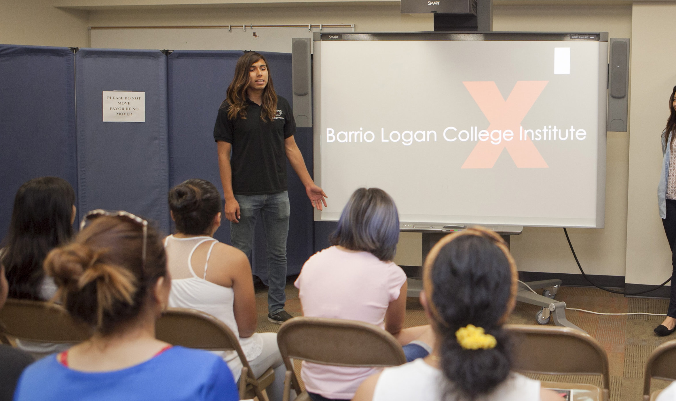 Francisco Martinez presenting to Barrio Logan College Institute students