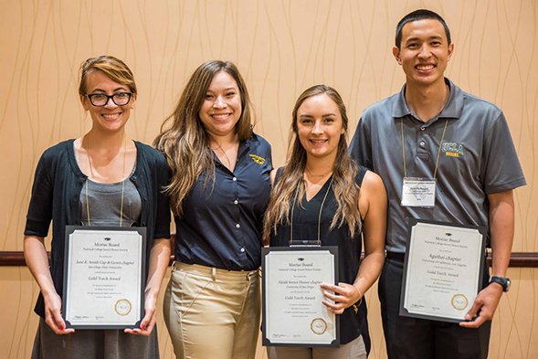 Chapter president Seraphina Solders (far left) accepted the Gold Torch award on behalf of the Jane K. Smith Cap &amp; Gown Chapter at SDSU. (Credit: Mortar Board)
