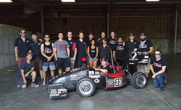 Members of Aztec Racing pose at the Formula SAE Lincoln 2016 competition in Lincoln, Neb. (Credit: Aztec Racing)
