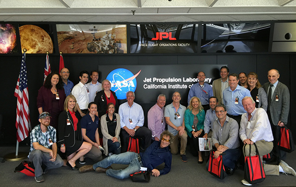 The SDSU Los Angeles Regional Council poses at mission control at the NASA Jet Propulsion Laboratory. (Photo: Jimmy Steinfeldt, Tari Weiss)