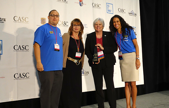 Trish Hatch (second from the right) accepts the the inaugural Counselor Educator of the Year Award from the California Association of School Counselors. (Credit: CASC)