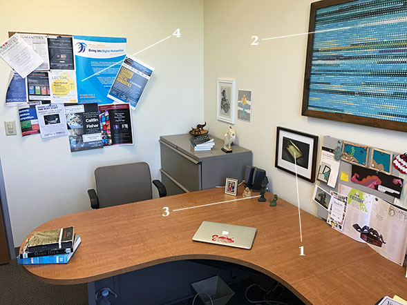 The desk of Jessica Pressman, an assistant professor in English and comparative literature and director of SDSUs Digital Humanities Initiative.
