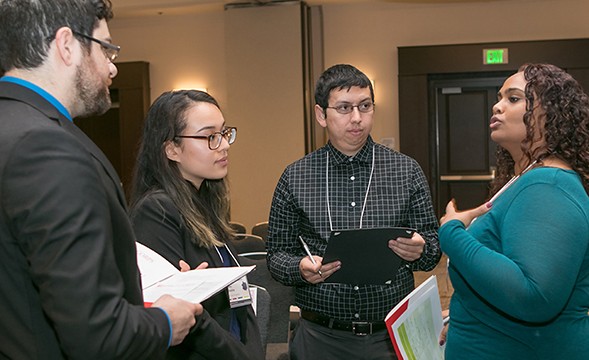 Students and researchers converse during a CSU I-Corps workshop earlier this year. (Credit: California State University)