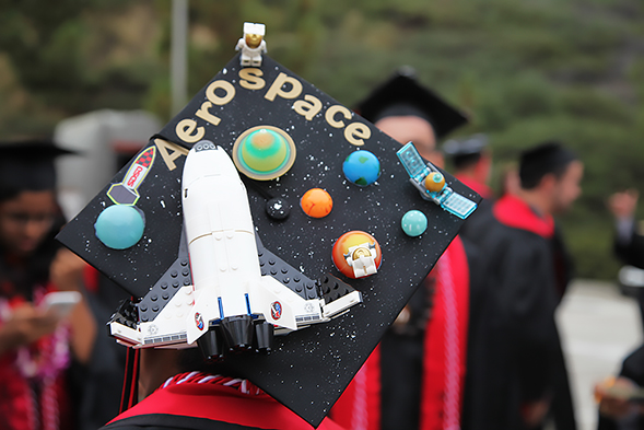 SDSU invites graduating students to share the originality and creativity of their decorated commencement caps.