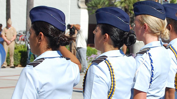 Women in the U.S. military at a ceremony on the SDSU campus.
