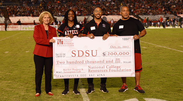 From left to right: SDSU President Sally Roush, NCRF president Theresa Price, Chase Price ('15) and Ricky Price