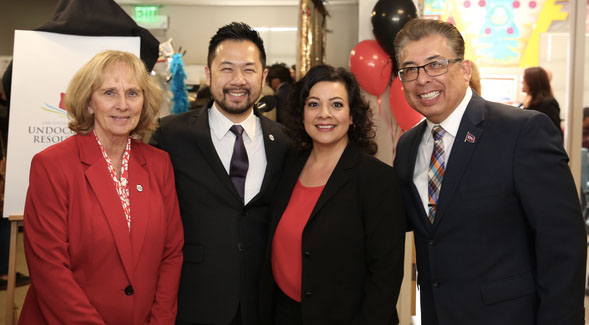 Vice President for Student Affairs Eric Rivera (far right) poses alongside former SDSU President Sally Roush and colleagues at the Undocumented Resource Area formal opening in May 2018.