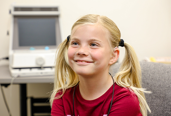 Lara, 8, has been wearing hearing aids since kindergarten. (Photo: Scott Hargrove)