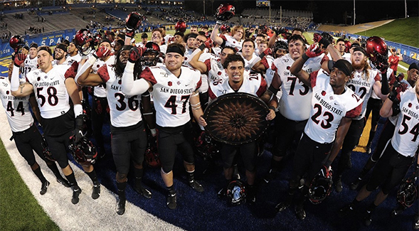 The Aztecs celebrate a victory in 2019.