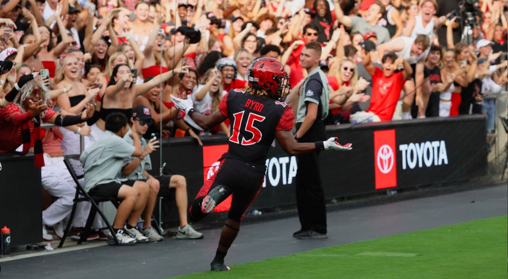SDSU running back Jordan Byrd (15) celebrates a touchdown run near the student section during the Aztecs game against Idaho State at Snapdragon Stadium, September 10, 2022. (SDSU)