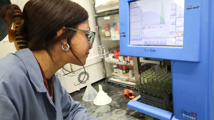 Alyssa Gomez monitors samples to ensure compounds are properly separated from each other after a reaction. (Bryana Quintana/SDSU)