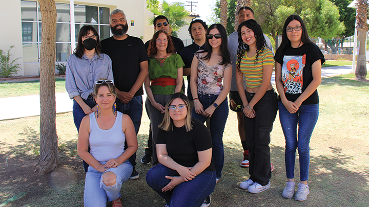 SDSU Imperial Valley students are photographed in the shade under a tree on their campus during a recent heat wave.