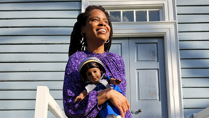 Lashon Daley and Addy on the steps of the Burgess Law Office in Historic Halifax, North Carolina