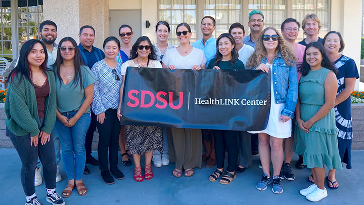 San Diego State University HealthLINK Center staff pose for a group photo.