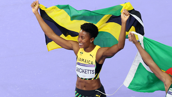 Silver medalist Shanieka Ricketts, wearing her Team Jamaica uniform, celebrates on the track following the Women's Triple Jump Final on day eight of the Olympic Games Paris 2024 at Stade de France in Paris, France.