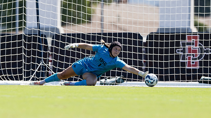 SDSU goalkeeper Alexa Madueno dives to save a shot in the Aztecs 2-0 win over UNLV on Sunday.