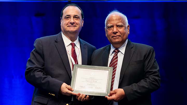 SDSU Dean of Engineering Eugene Olevsky (left) with Mrityunjay Singh, president of the International Advisory Board of the World Academy of Ceramics, at an August ceremony in Budapest.