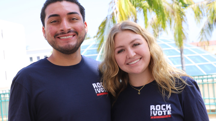 SDSU students pose for photos with their Rock the Vote branded t-shirts.