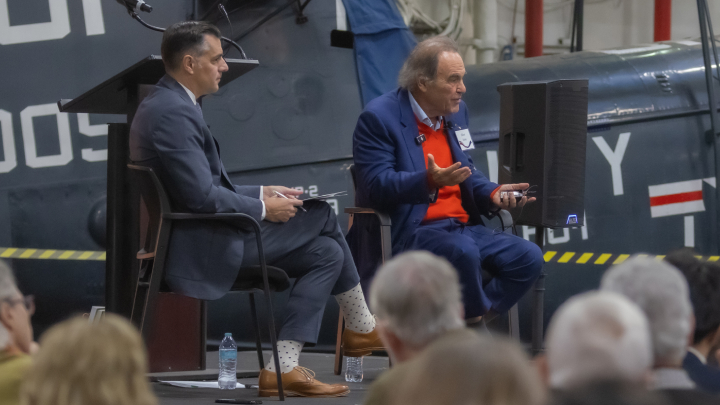 Academy Award-winning film director and screenwriter Oliver Stone leads the "Vietnam at 50: Documenting the Legacies of America’s Forever Wars" lecture aboard USS Midway on Nov. 14, 2024