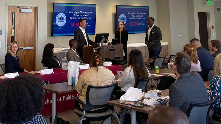 People attending a workshop in a classroom at SDSU's School of Public Affairs.