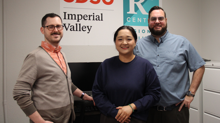 Jeffery Osborne, Huan Qin and David Kanaan pose for a photograph in their new Regional Resilience (R2) Center.