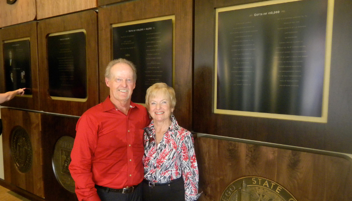 SDSU alumni Jerry (‘58) and Carolyn Davee (‘59) pose for a photograph at the university